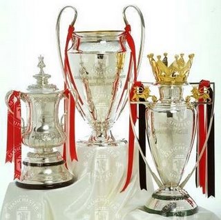manchester_united_treble_trophies_p.jpg